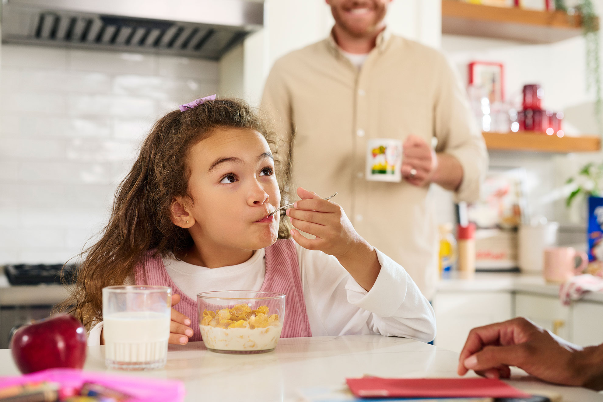 Little girl eating cereal